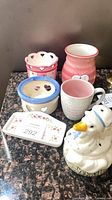 Group shot showing all six ceramic items on countertop