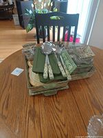 Stacked view showing trays, bowls, plates and utensils