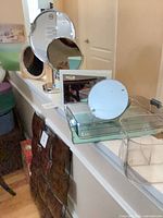 Front view showing Clinique mirror and both acrylic organizers