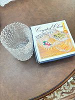 Boxed Crystal Clear 4-section server beside cut glass vase