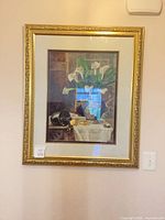 Full view of framed still life print in gold frame