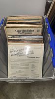 Bin containing stack of LP records