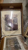 Abstract print in cream mat within shipping box