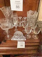 Group shot of all crystal and glass pieces on shelf
