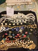 Overview of all jewelry pieces on tray