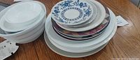 Stacks of plates and bowls showing counts, colours and patterns