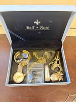Jewelry pieces inside Bell & Rose box