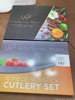 Front of Wolfgang Puck 10-piece nonstick cutlery set box