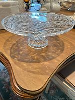 Crystal cake stand assembled on table