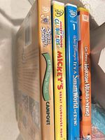 Spines of four DVD cases showing titles and publishers
