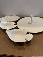 Group shot showing all four Lenox ivory porcelain pieces
