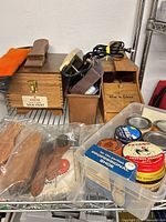 Overview showing both wooden valets, plastic caddy, polish tins, brushes and cedar trees