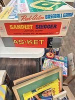 Stacked view of three boxed games