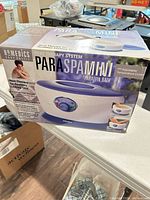 Front of boxed HoMedics ParaSpa Mini paraffin bath