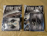 Both sealed issue 37 and 40 packs showing magazines and models