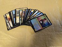 Fanned view of all thirty cards showing variety and condition