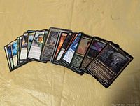 Spread of all 30 Magic cards fanned out