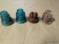 Four different insulators lined up