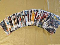 Arc of bagged and boarded Batman Eternal comics issues 1-52 displayed face up