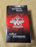 Front of sealed CFL 100th Grey Cup Historical Boxset showing title and event details