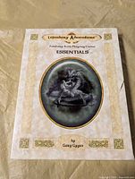 Front of Legendary Adventure Essentials boxed set showing title, artwork, designer credit