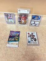 All items: graded Trent McDuffie card, three ungraded cards, sealed Prestige 2020 pack