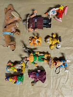 Top view of all figures spread on fabric