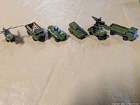 All six green Matchbox military vehicles lined up