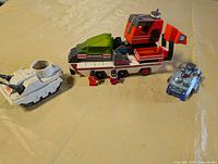 Overall view of all vehicles and figures