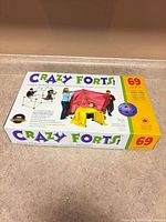 Front of sealed Crazy Forts box showing product name and children playing