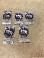 Front view of five sealed Upper Deck Series One hockey packs