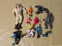 Group shot of all eleven figures on surface
