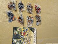 Eight sealed part bags alongside folded Star Soldier retail pouch