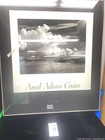 Front view of framed black-and-white Ansel Adams Center print showing image, mat, and frame