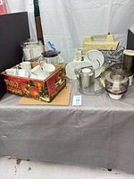 Lot overview with processor parts, blender jar, mugs box, mixer base, attachments visible