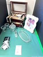 overview showing jewelry box, costume jewelry, glass items, picture frame