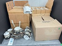 overall lot showing loose pieces and several packed boxes