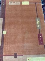 Full view of the rug showing overall design and color palette