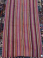 Full view of striped kilim rug