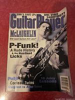 Front cover showing title, cover feature text, torn corner