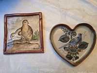 Both plaques together showing overall designs