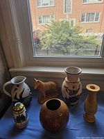 All six items grouped on blue cloth