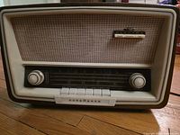 Front view of Nordmende Elektra radio showing knobs, grille, dial, push-buttons