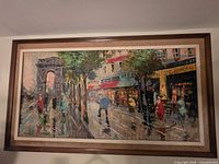 Full view of framed landscape oil painting