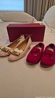 Both pairs of shoes with box