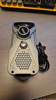 Front view of radio with USB cable visible