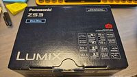 Top view of Panasonic Lumix ZS3 retail box showing model and features