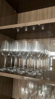 Shelf view showing all 12 wine glasses lined up