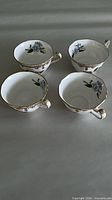 Top view of four Spode Stafford Flowers bone china teacups