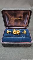 Cufflinks in open Tiffany & Co. presentation box